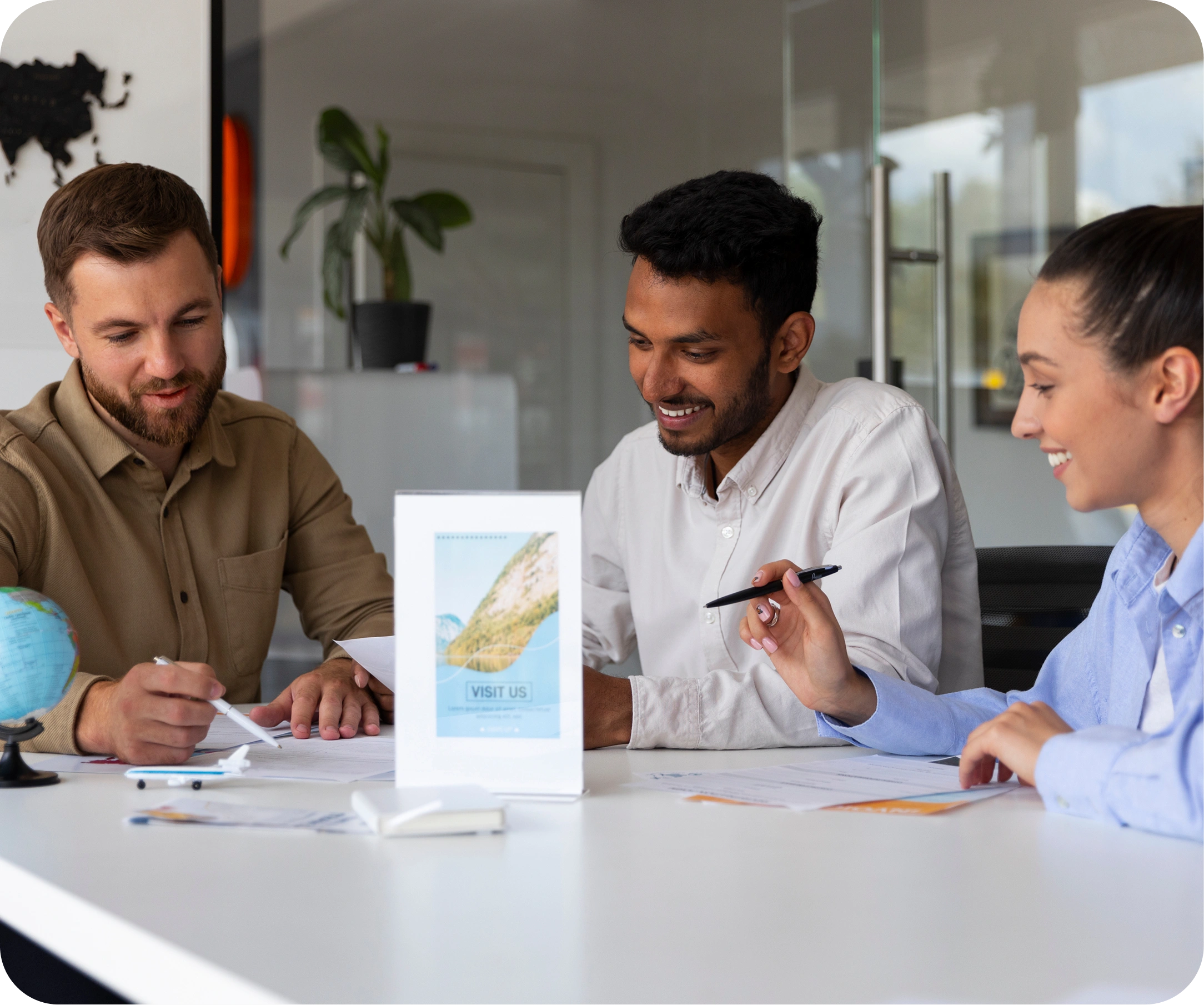 Image showing trusted migration consultants in Thodupuzha helping individuals achieve their Canadian and Australian visa dreams. Authored by Intelligen Immigration